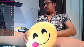 Play A shy young man masturbates placing a pillow in front of him so they can't see his huge cock, he doesn't realize that his big bright pink head of penis is reaching up to look beautiful.